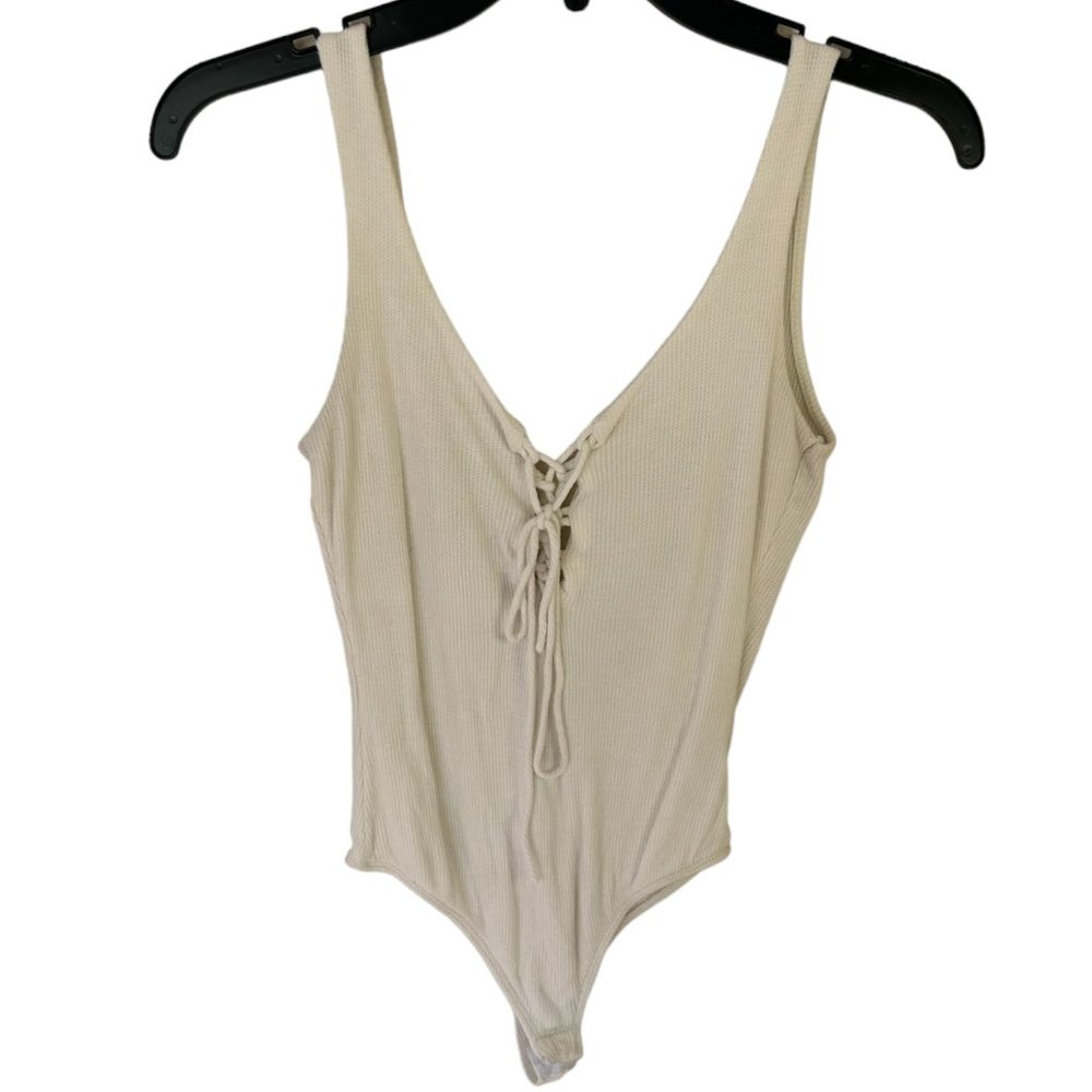 Blanc white body suit. Size small. Casual & can be dressed up.  011